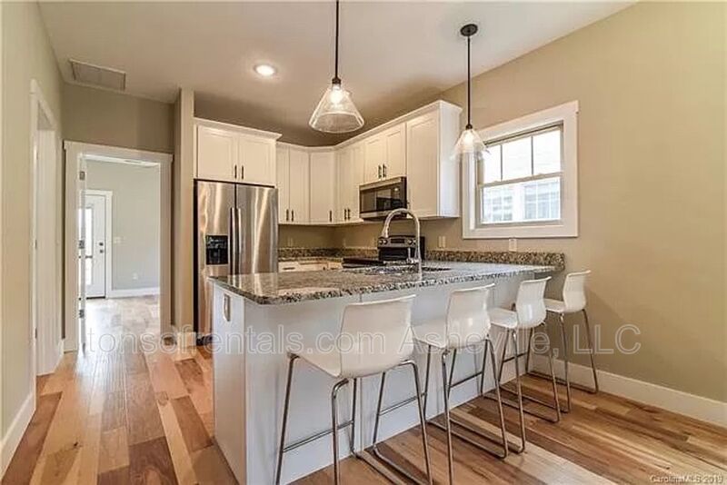 Beautiful 4-bedroom, 2.5-bathroom single-family home located in Asheville, NC. property image