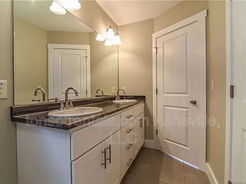 Beautiful 4-bedroom, 2.5-bathroom single-family home located in Asheville, NC. property image