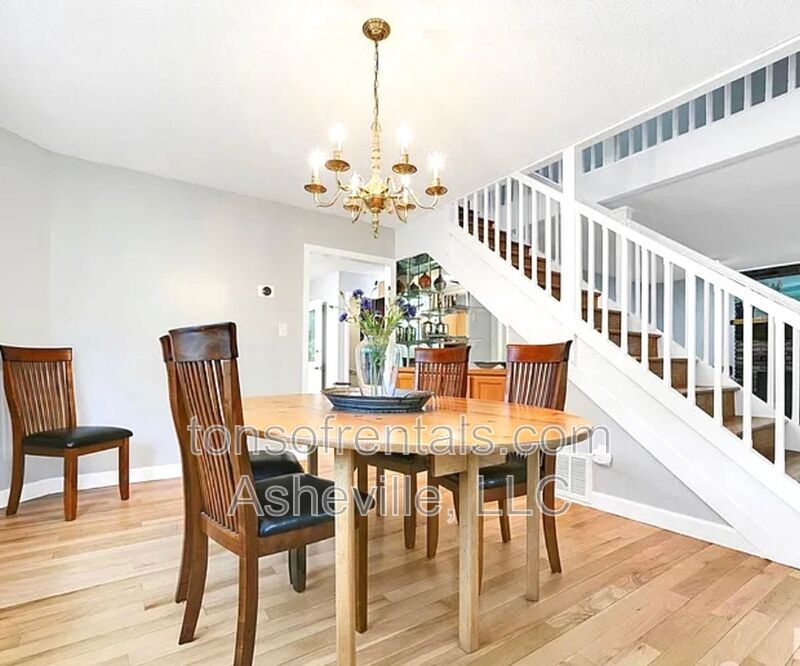 This beautiful freshly painted single-family home in Pisgah Forest, NC offers 3 bedrooms, 2.5 bathrooms, and multiple living spaces including a bonus room and a gas fireplace. property image