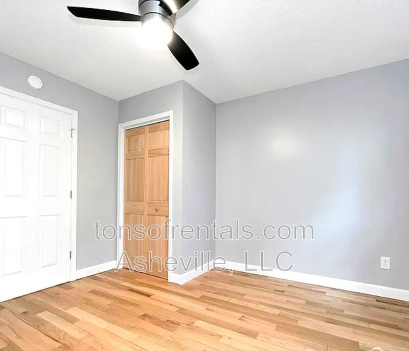 This beautiful freshly painted single-family home in Pisgah Forest, NC offers 3 bedrooms, 2.5 bathrooms, and multiple living spaces including a bonus room and a gas fireplace. property image