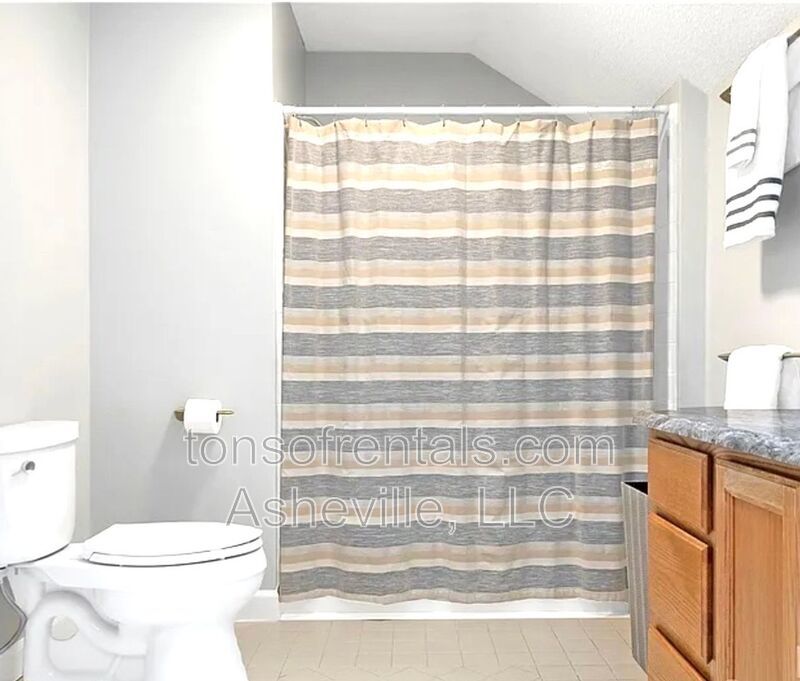 This beautiful freshly painted single-family home in Pisgah Forest, NC offers 3 bedrooms, 2.5 bathrooms, and multiple living spaces including a bonus room and a gas fireplace. property image