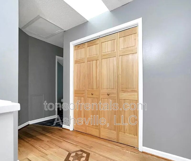 This beautiful freshly painted single-family home in Pisgah Forest, NC offers 3 bedrooms, 2.5 bathrooms, and multiple living spaces including a bonus room and a gas fireplace. property image