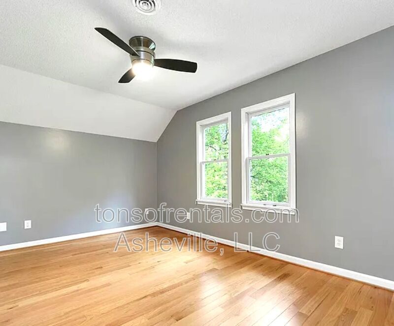 This beautiful freshly painted single-family home in Pisgah Forest, NC offers 3 bedrooms, 2.5 bathrooms, and multiple living spaces including a bonus room and a gas fireplace. property image