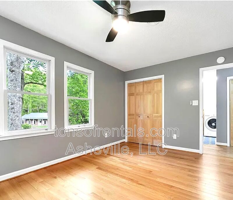 This beautiful freshly painted single-family home in Pisgah Forest, NC offers 3 bedrooms, 2.5 bathrooms, and multiple living spaces including a bonus room and a gas fireplace. property image