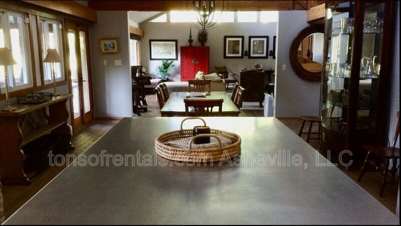 Welcome to your dream home in Arden, NC. This stunning 5-bedroom, 3.5-bathroom house is nestled on a 20-acre lot at the end of a cul-de-sac, offering breathtaking lake views. property image