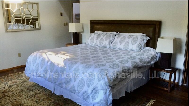 Welcome to your dream home in Arden, NC. This stunning 5-bedroom, 3.5-bathroom house is nestled on a 20-acre lot at the end of a cul-de-sac, offering breathtaking lake views. property image