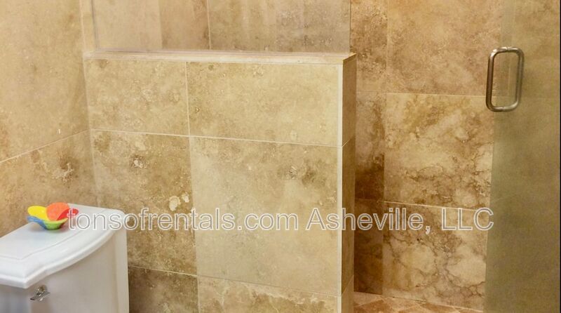 Welcome to your dream home in Arden, NC. This stunning 5-bedroom, 3.5-bathroom house is nestled on a 20-acre lot at the end of a cul-de-sac, offering breathtaking lake views. property image