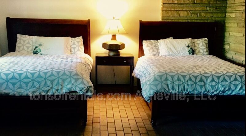 Welcome to your dream home in Arden, NC. This stunning 5-bedroom, 3.5-bathroom house is nestled on a 20-acre lot at the end of a cul-de-sac, offering breathtaking lake views. property image