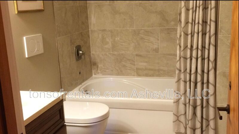 Welcome to your dream home in Arden, NC. This stunning 5-bedroom, 3.5-bathroom house is nestled on a 20-acre lot at the end of a cul-de-sac, offering breathtaking lake views. property image