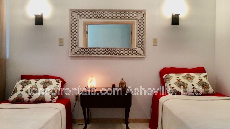 Welcome to your dream home in Arden, NC. This stunning 5-bedroom, 3.5-bathroom house is nestled on a 20-acre lot at the end of a cul-de-sac, offering breathtaking lake views. property image