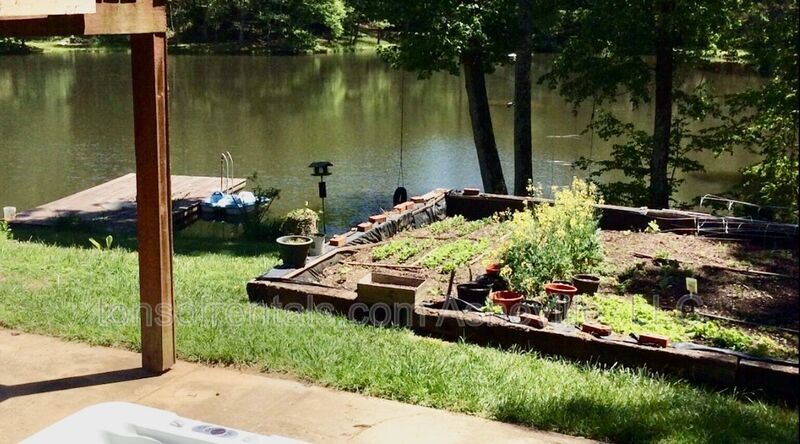 Welcome to your dream home in Arden, NC. This stunning 5-bedroom, 3.5-bathroom house is nestled on a 20-acre lot at the end of a cul-de-sac, offering breathtaking lake views. property image