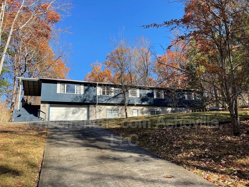 This stunning home is located in Arden, a mile from Glen Bridge River Park, perfect for kayaking & fishing on the French Broad River. property image
