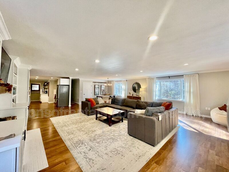 This stunning home is located in Arden, a mile from Glen Bridge River Park, perfect for kayaking & fishing on the French Broad River. property image