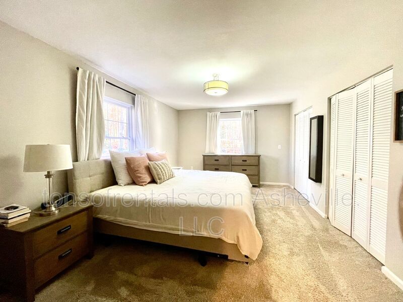 This stunning home is located in Arden, a mile from Glen Bridge River Park, perfect for kayaking & fishing on the French Broad River. property image