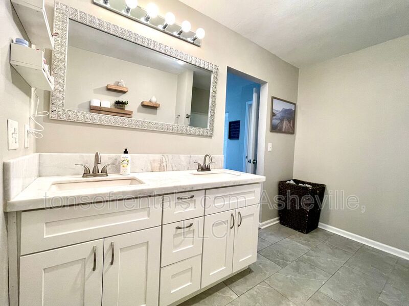 This stunning home is located in Arden, a mile from Glen Bridge River Park, perfect for kayaking & fishing on the French Broad River. property image