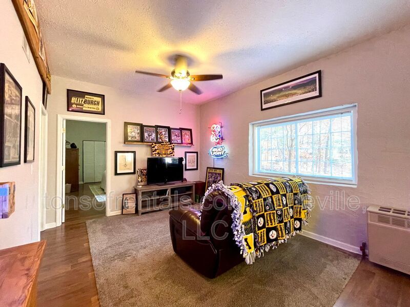 This stunning home is located in Arden, a mile from Glen Bridge River Park, perfect for kayaking & fishing on the French Broad River. property image