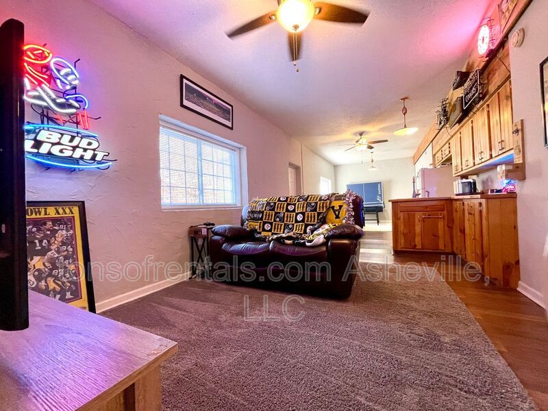 This stunning home is located in Arden, a mile from Glen Bridge River Park, perfect for kayaking & fishing on the French Broad River. property image