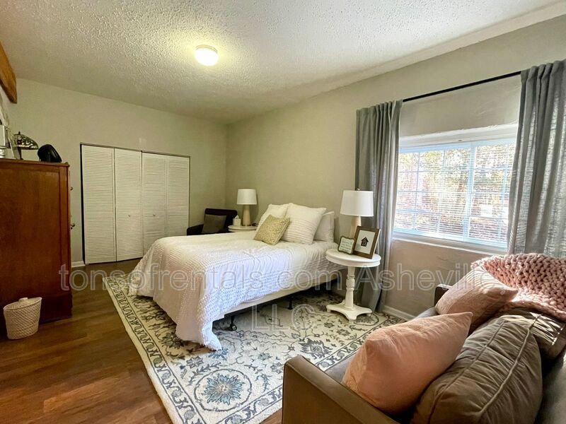 This stunning home is located in Arden, a mile from Glen Bridge River Park, perfect for kayaking & fishing on the French Broad River. property image