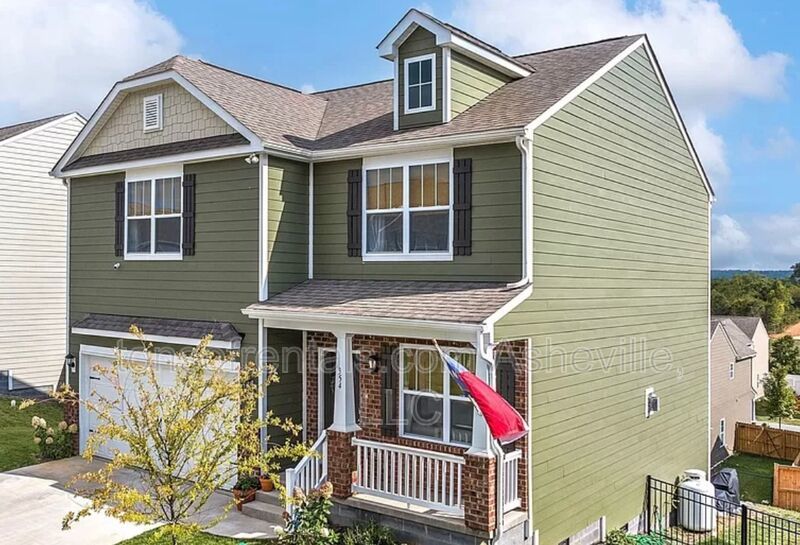 Welcome to this beautiful 4-bedroom, 2.5-bath home located in the charming town of Candler. property image