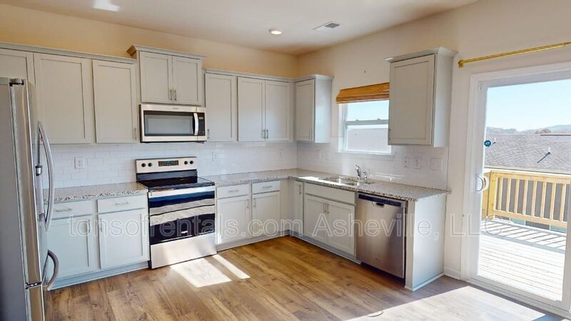 Welcome to this beautiful 4-bedroom, 2.5-bath home located in the charming town of Candler. property image