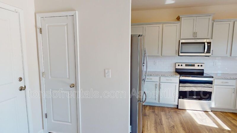 Welcome to this beautiful 4-bedroom, 2.5-bath home located in the charming town of Candler. property image