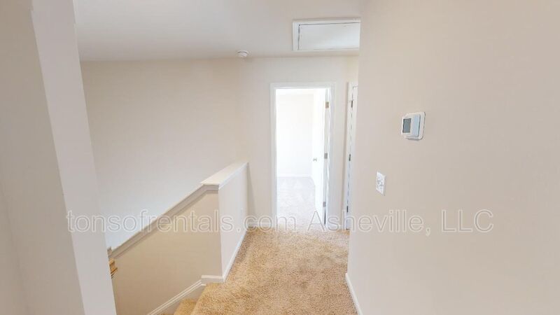 Welcome to this beautiful 4-bedroom, 2.5-bath home located in the charming town of Candler. property image
