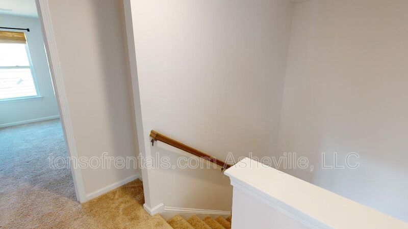 Welcome to this beautiful 4-bedroom, 2.5-bath home located in the charming town of Candler. property image