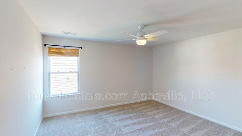 Welcome to this beautiful 4-bedroom, 2.5-bath home located in the charming town of Candler. property image