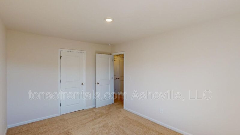 Welcome to this beautiful 4-bedroom, 2.5-bath home located in the charming town of Candler. property image