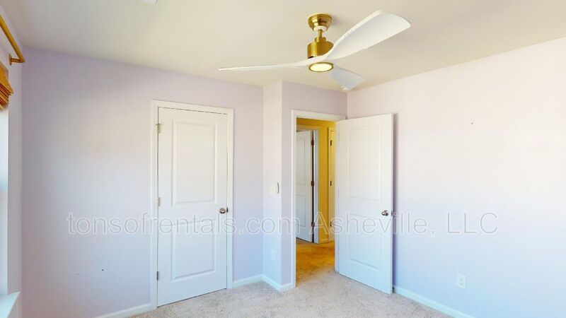 Welcome to this beautiful 4-bedroom, 2.5-bath home located in the charming town of Candler. property image