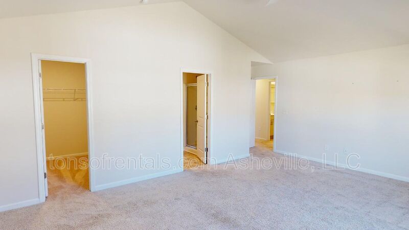 Welcome to this beautiful 4-bedroom, 2.5-bath home located in the charming town of Candler. property image