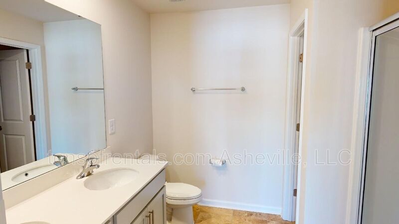 Welcome to this beautiful 4-bedroom, 2.5-bath home located in the charming town of Candler. property image