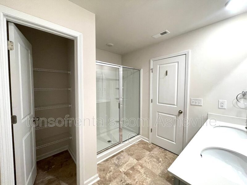 Welcome to this beautiful 4-bedroom, 2.5-bath home located in the charming town of Candler. property image