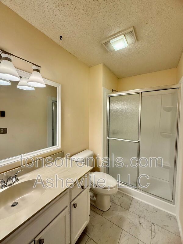 Welcome to this spacious 2 bedroom, 2 bathroom condo located in the beautiful city of Hendersonville, NC. property image