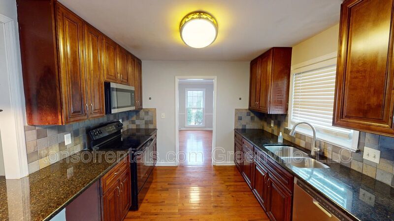 Elegant home with two Master Suites, two family rooms and in an excellent location of Greenville! property image