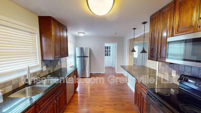 Elegant home with two Master Suites, two family rooms and in an excellent location of Greenville! property image