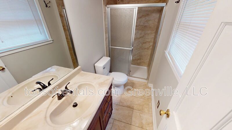 Elegant home with two Master Suites, two family rooms and in an excellent location of Greenville! property image