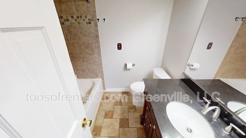 Elegant home with two Master Suites, two family rooms and in an excellent location of Greenville! property image