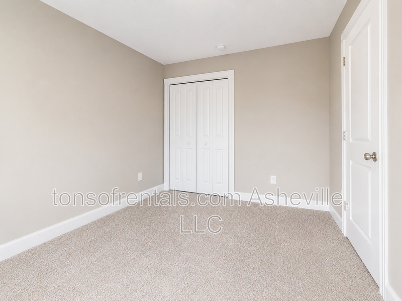 Beautiful 4-bedroom, 2.5-bathroom single-family home located in Asheville, NC. property image
