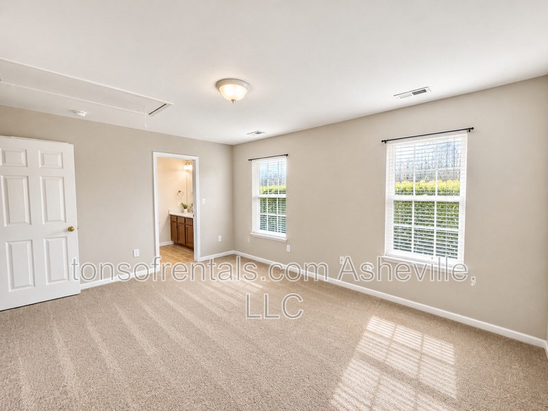 Welcome to this 3 bedroom 2.5 bath townhome located in the heart of Fletcher, NC! property image
