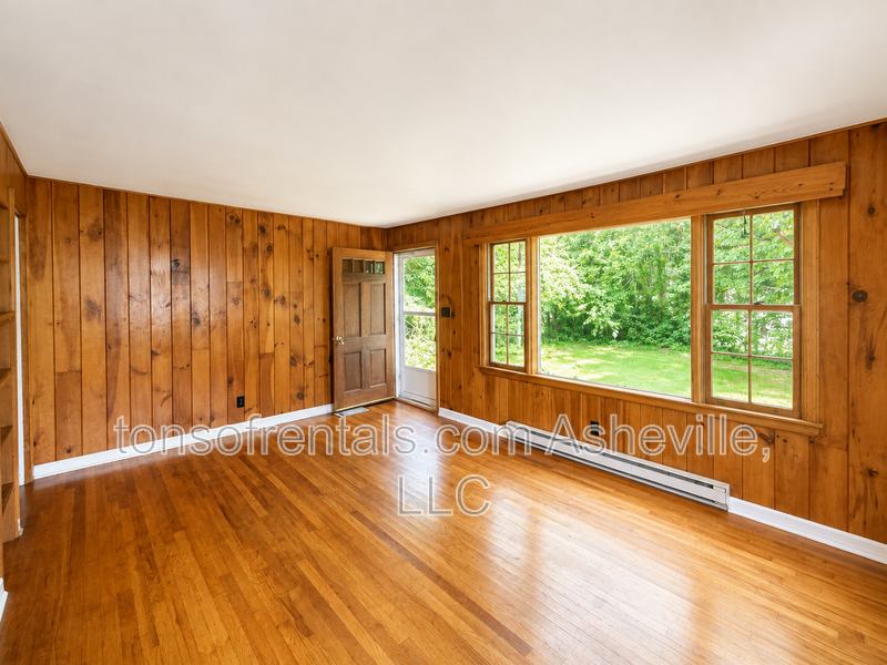 Looking for a home instead of an apartment? This charming 2-bedroom Asheville home offers hardwood floors, a private yard, driveway parking, central A/C and plenty of character—and dogs are welcome! property image