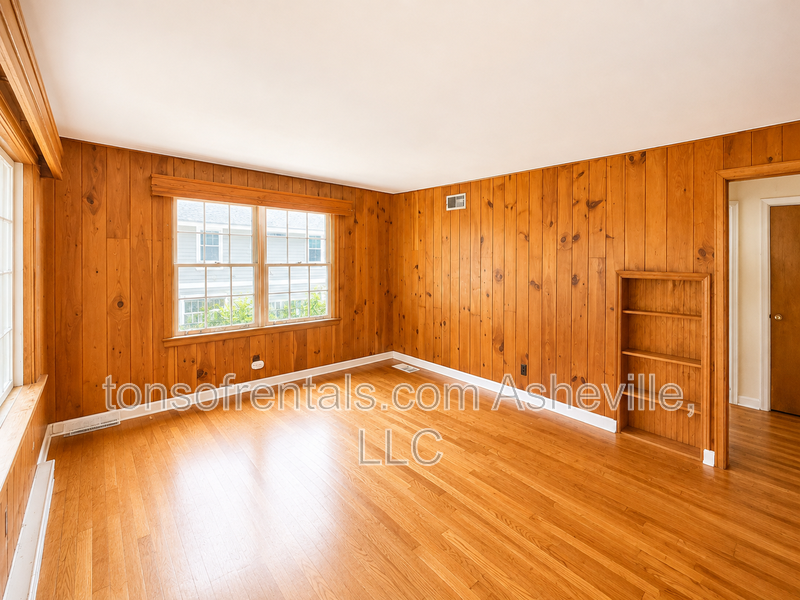 Looking for a home instead of an apartment? This charming 2-bedroom Asheville home offers hardwood floors, a private yard, driveway parking, central A/C and plenty of character—and dogs are welcome! property image