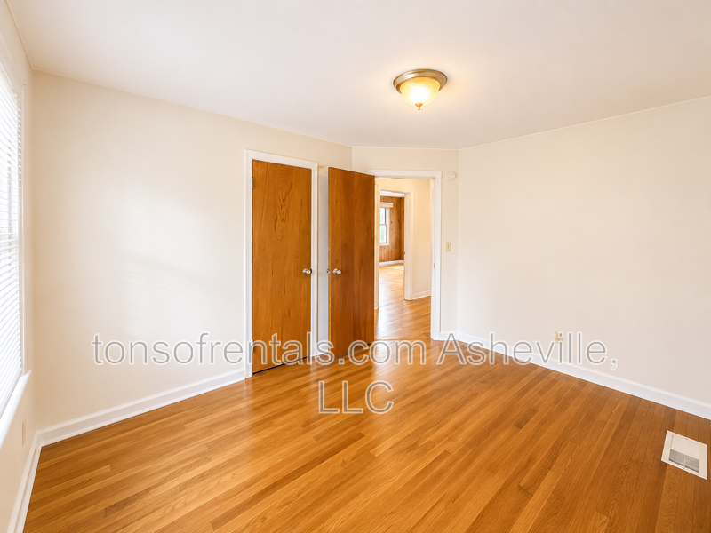 Looking for a home instead of an apartment? This charming 2-bedroom Asheville home offers hardwood floors, a private yard, driveway parking, central A/C and plenty of character—and dogs are welcome! property image