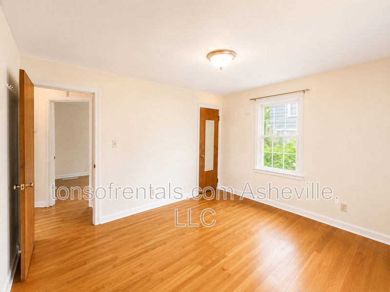 Looking for a home instead of an apartment? This charming 2-bedroom Asheville home offers hardwood floors, a private yard, driveway parking, central A/C and plenty of character—and dogs are welcome! property image