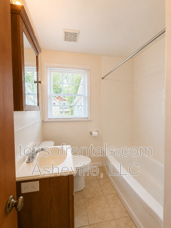 Looking for a home instead of an apartment? This charming 2-bedroom Asheville home offers hardwood floors, a private yard, driveway parking, central A/C and plenty of character—and dogs are welcome! property image