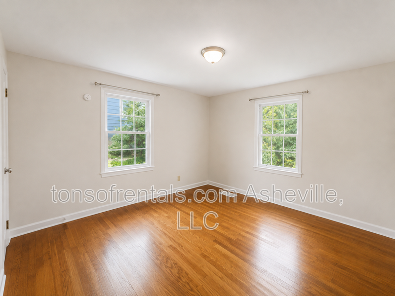 Looking for a home instead of an apartment? This charming 2-bedroom Asheville home offers hardwood floors, a private yard, driveway parking, central A/C and plenty of character—and dogs are welcome! property image
