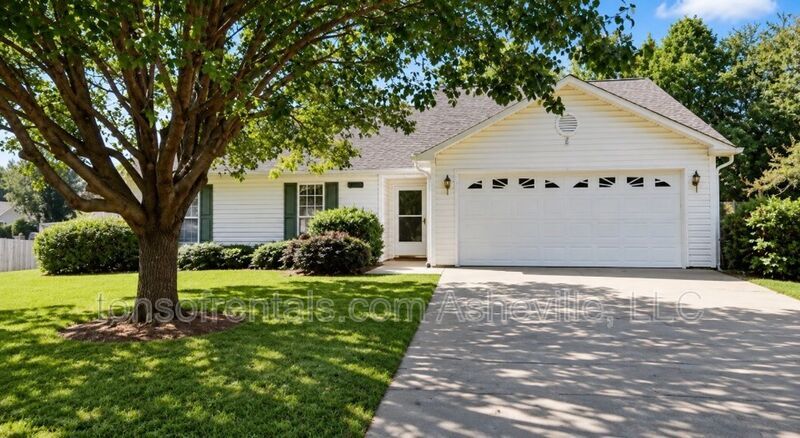 Welcome to this charming single-family home located in the beautiful town of Fletcher, NC. property image