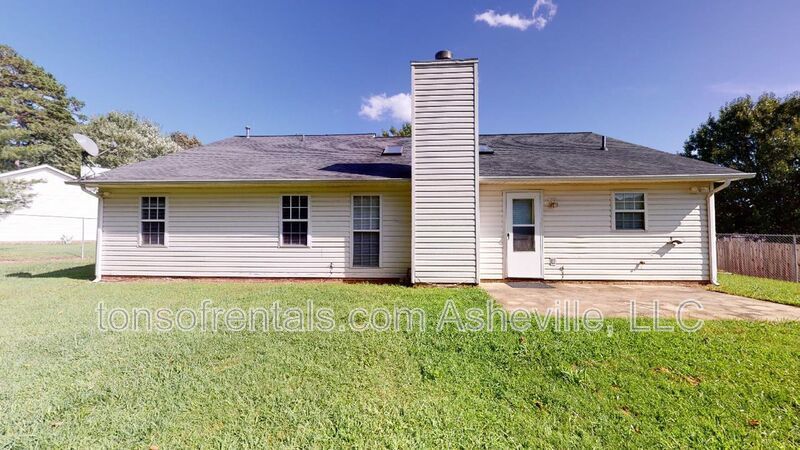 Welcome to this charming single-family home located in the beautiful town of Fletcher, NC. property image