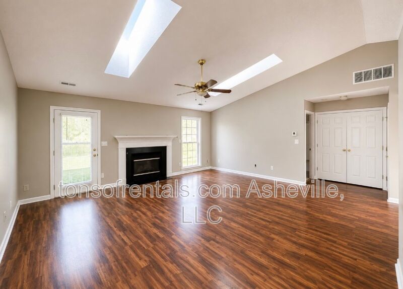 Welcome to this charming single-family home located in the beautiful town of Fletcher, NC. property image