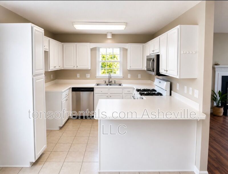 Welcome to this charming single-family home located in the beautiful town of Fletcher, NC. property image